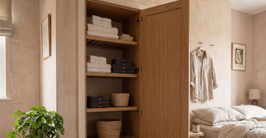Towel airing cupboard for storage.