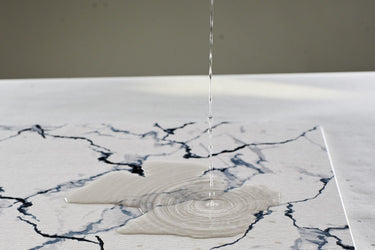Absorbent stone bath mat