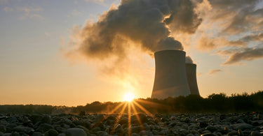 Low Angle Photo Of Nuclear Power Plant Buildings Emtting Smoke