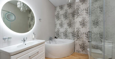 Modern bathroom interior with washstand and mirror against glass wall